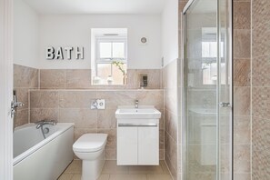 Shower, towels, toilet paper