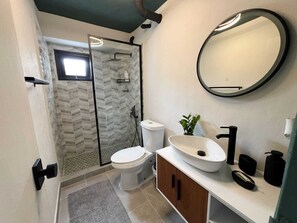 Shower, hair dryer, towels, soap