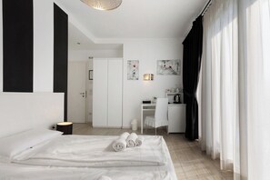 1 chambre, fer et planche à repasser, Wi-Fi gratuit, draps fournis