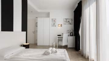 1 habitación, tabla de planchar con plancha, wifi gratis y ropa de cama