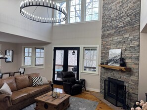 Smart TV, fireplace, books