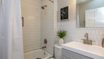 Hair dryer, towels, soap, shampoo