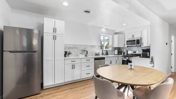Coffee/tea maker, fridge, microwave, oven
