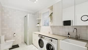 Shower, hair dryer, towels, soap