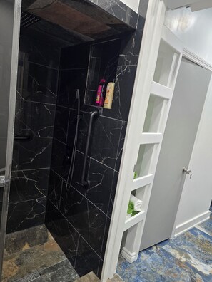 Shower, hair dryer, towels, soap