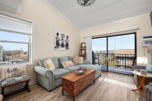 TV, fireplace - Charming Beachside Condo (Ocean City)