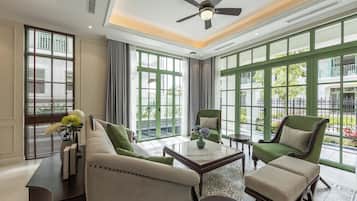 Family Villa, 4 Bedrooms, Pool View | Living area | 50-inch Smart TV with digital channels