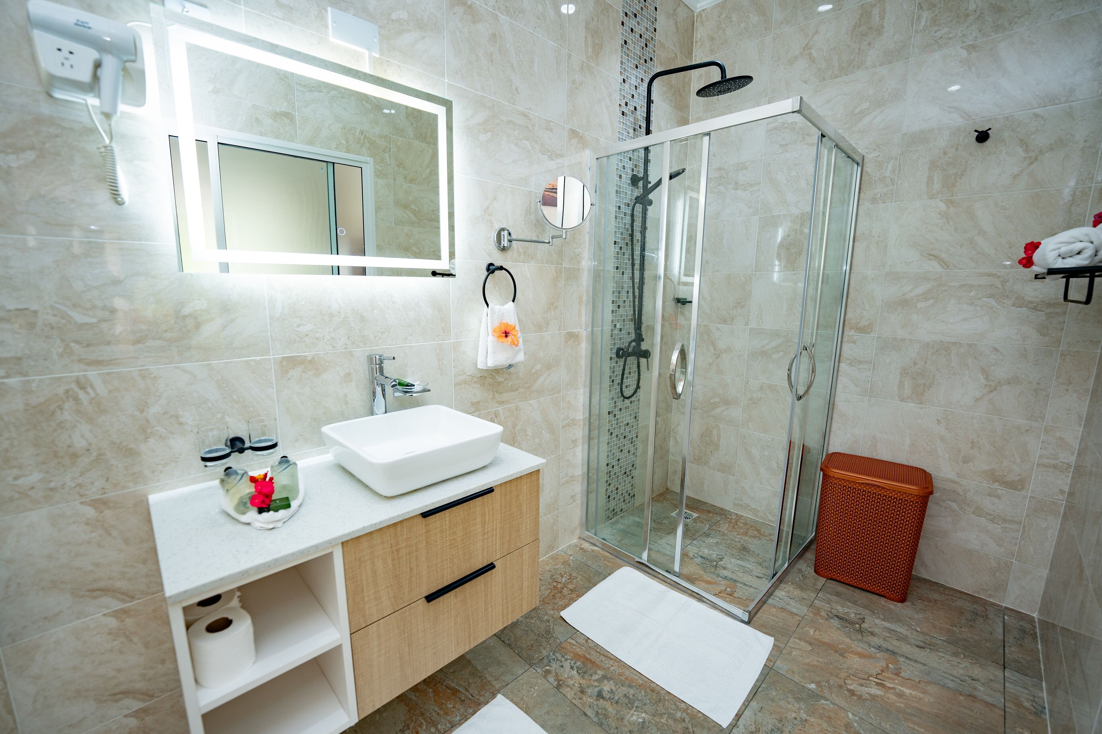 Shower, hair dryer, towels, soap