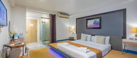 Deluxe Double Room | Minibar, in-room safe, iron/ironing board, free WiFi