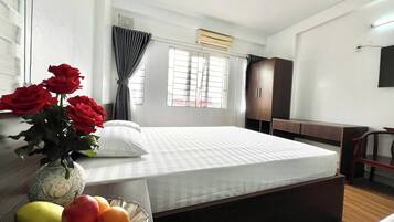 Family Room | Premium bedding, down comforters, memory foam beds, desk