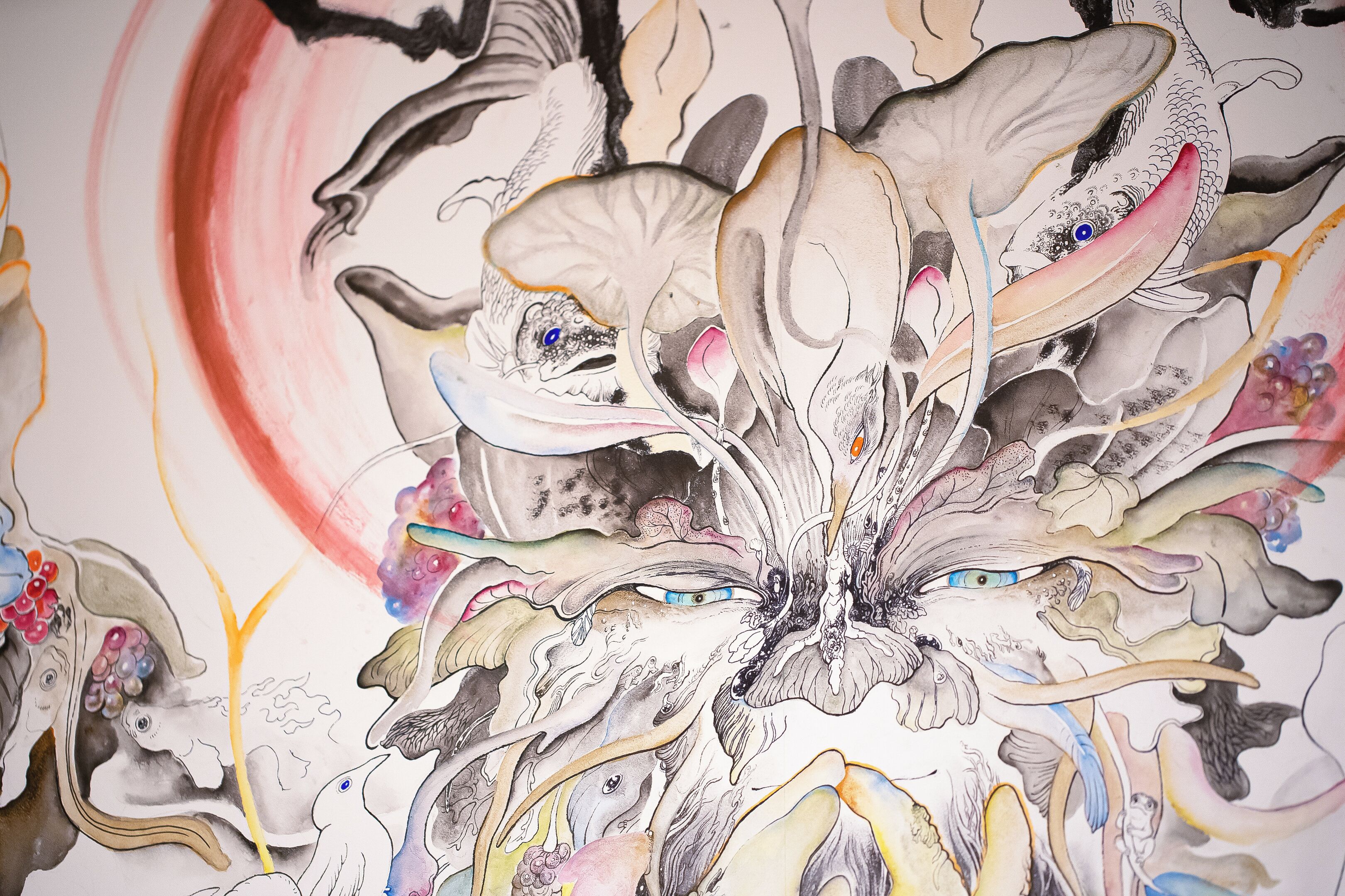 A detailed artwork with abstract and surreal elements, including floral and animal motifs.