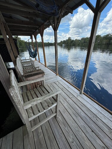 Beautiful river front studio with dock and adjacent boat ramp