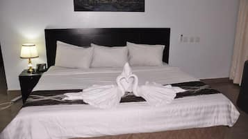 Economy Room, Balcony, City View | Desk, laptop workspace, blackout drapes, soundproofing