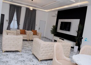 Luxury Apartment, Balcony, City View | Living area - DEOSEA APARTMENTS (Abuja)