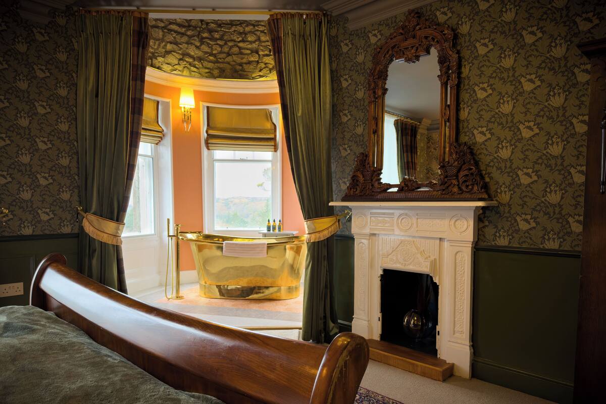 Desk, laptop workspace, blackout drapes, iron/ironing board