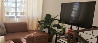Friendly neighborhood with garden that you can relax while  sipping your coffee.