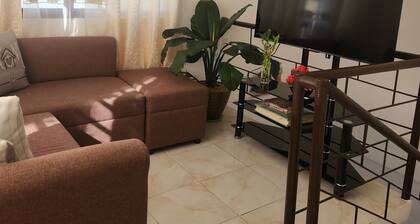 Friendly neighborhood with garden that you can relax while sipping your coffee.