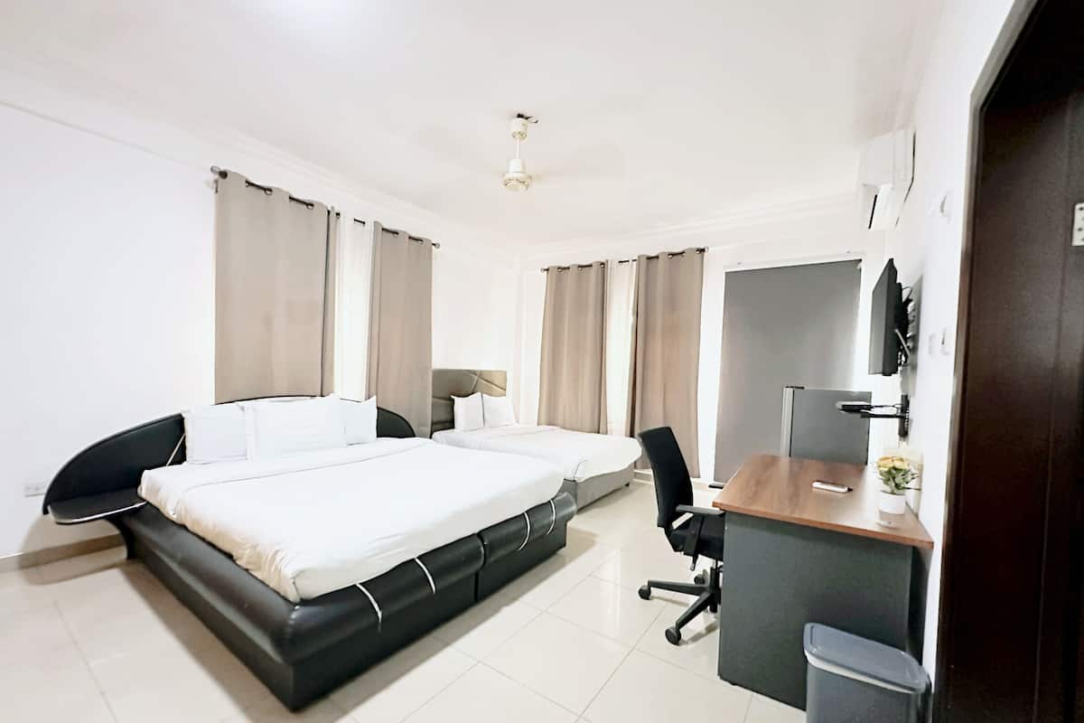 Habitación ejecutiva con 2 camas individuales | Wifi gratis y ropa de cama