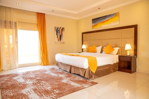 Suite, Kitchenette, Partial Sea View | 1 bedroom, soundproofing, free WiFi