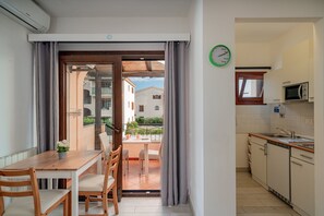 Classic Studio, 1 Double Bed, Balcony | Living area | Flat-screen TV - Studio's Pavese (Olbia)