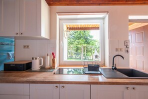 Fridge, stovetop, electric kettle, highchair