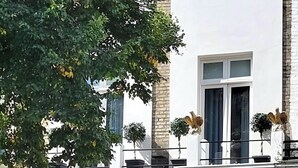 A two-story townhouse with a black door marked "111". - *NEW* Notting Hill - It's The One One One! (2) (London)