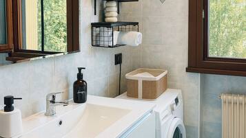 Hair dryer, bidet, towels, toilet paper