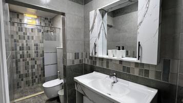 Shower, towels, soap, shampoo