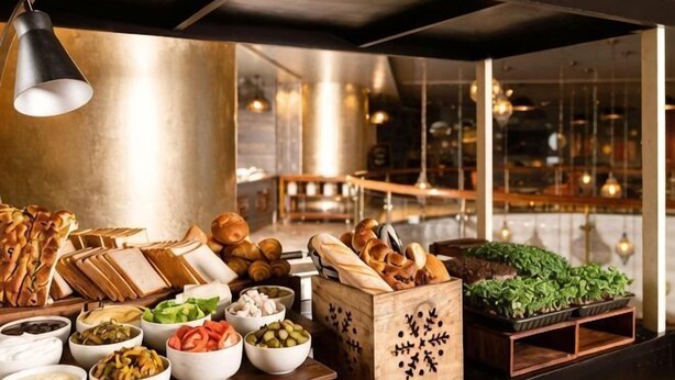 A buffet with various food items and a decorative wooden box. - Grand Mercure Bengaluru at Gopalan Mall, An Accor Hotels Brand (Bengaluru)