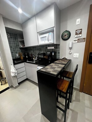 Microwave, stovetop, coffee/tea maker, toaster