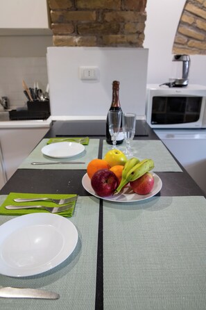 Fridge, microwave, stovetop, cookware/dishes/utensils