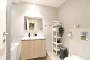 Hair dryer, towels, soap, toilet paper