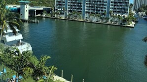 A high-rise hotel with multiple balconies overlooking a marina. - Classy, Eclectic, Congenial hotel suite in charming Fort Lauderdale Florida (Fort Lauderdale)