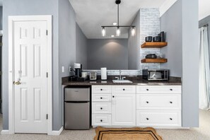 Microwave, coffee/tea maker, toaster, cookware/dishes/utensils