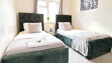 2 bedrooms, desk, iron/ironing board, travel cot