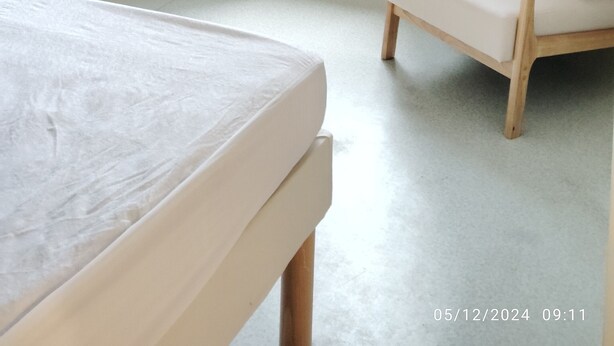A room with a bed, a chair, a desk, and a window with curtains. - Studio+outside Ribérac town center2 (Ribérac)