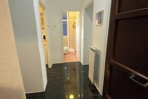 Hair dryer, bidet, towels, toilet paper