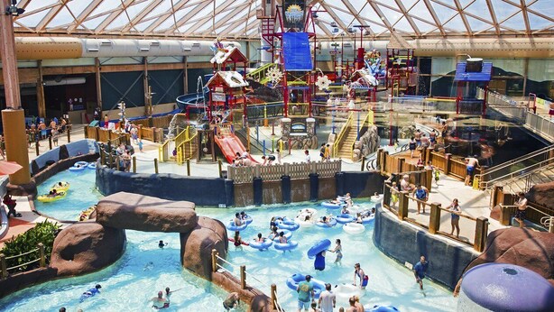 An indoor water park with multiple pools, slides, and play areas. - Regal Vistas 2 BR 2 BA House at Massanutten Resort (Massanutten)