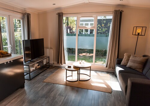 Chalet cosy acceptant les chiens près de la Veluwe avec jardin & piscine