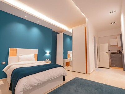 Efficient Single Studio perfect for solo travelers with AC & lovely kitchenette