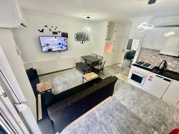 Duplex básico, sacada, vista para o jardim | Área de estar