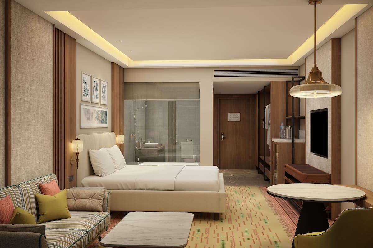 Deluxe Room, 1 King Bed | Premium bedding, minibar, in-room safe, desk