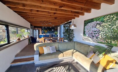 Designer House with Spectacular Lake Views, Jacuzzi and Lush Gardens