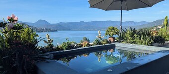 Designer House with Spectacular Lake Views, Jacuzzi and Lush Gardens