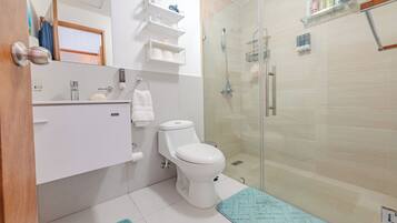 Shower, hair dryer, towels, soap