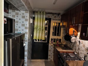 Fridge, microwave, oven, cookware/dishes/utensils - Modern one bedroom house in Roysambu Mirema (Nairobi)