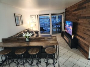 Smart TV, table football, books, computer monitors - Port Clinton Paradise: 2 bedroom Waterfront Condo:  Hot Tub, Sauna, Fire pit (Port Clinton)