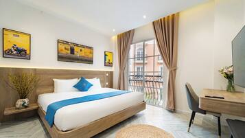 Superior Suite, Courtyard View | Laptop workspace, blackout drapes, free WiFi