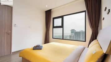 Design Apartment, 3 Bedrooms, Balcony, City View | Premium bedding, free minibar, desk, blackout drapes