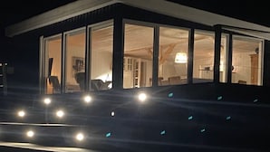 A modern building with large glass windows and a flat roof. - "Shaya" - 325m from the sea by Interhome (Allingåbro)